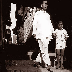 Father and Son descending towards the ghats - Click for Thumbnails